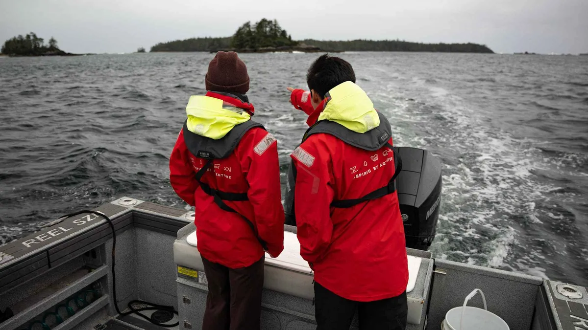 Private boat pulling a crab trap near Meares Island on a Tofino crabbing tour