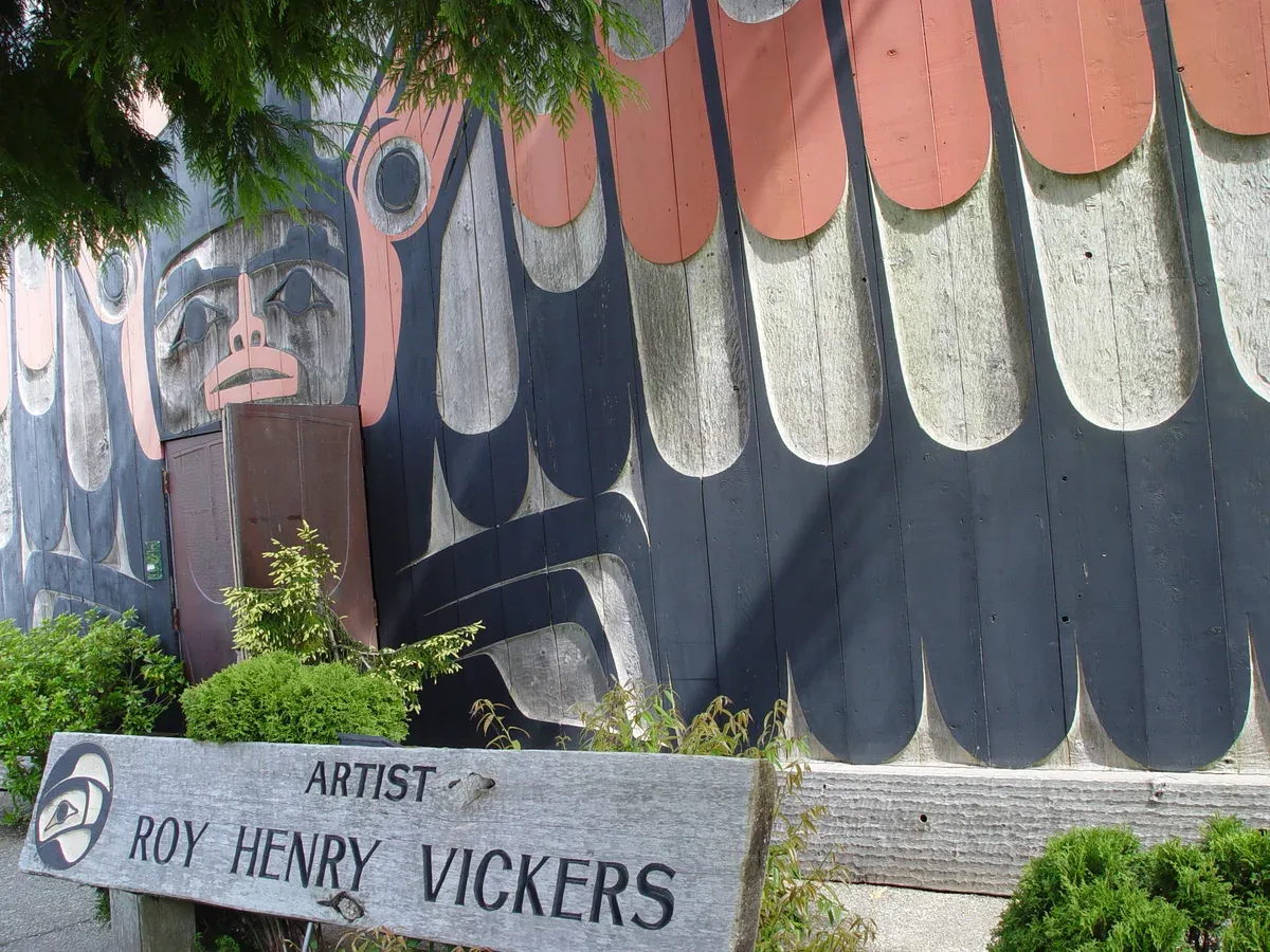 Hand-painted Northwest Coast formline mural on the exterior wall of the Roy Henry Vickers Gallery in Tofino